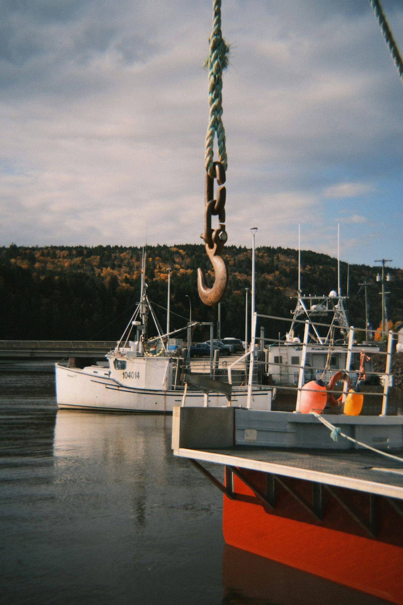 Fishing boats tied up at a small harbour in New Brunswick