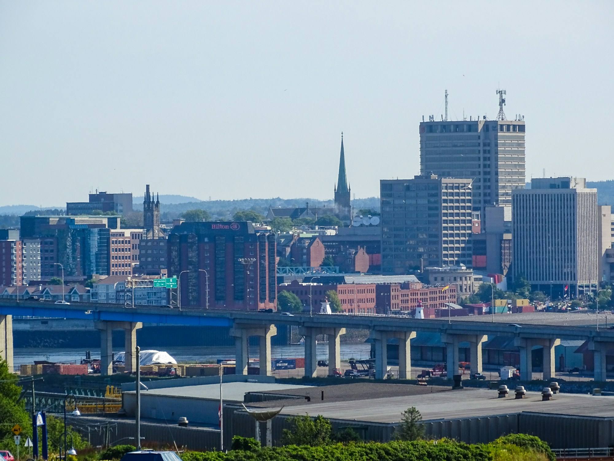 Uptown Saint John's skyline and harbour bridge on a clear day